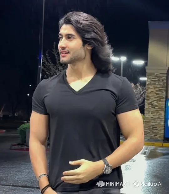 Confident Man in Parking Lot Amidst Night Rainfall – AI Generated Video | Hailuo AI