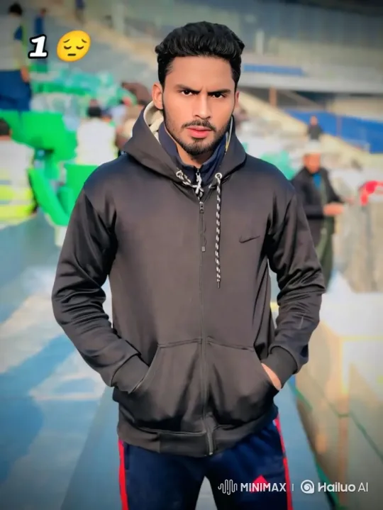 Young Man with Intense Gaze in Stadium Setting – AI Generated Video | Hailuo AI
