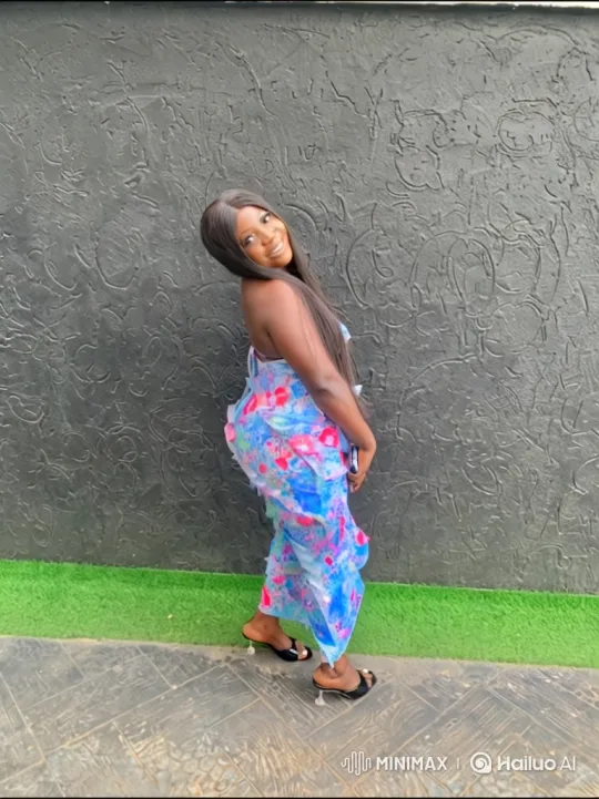 Woman in Floral Dress Walks Gracefully on Patio – AI Generated Video | Hailuo AI