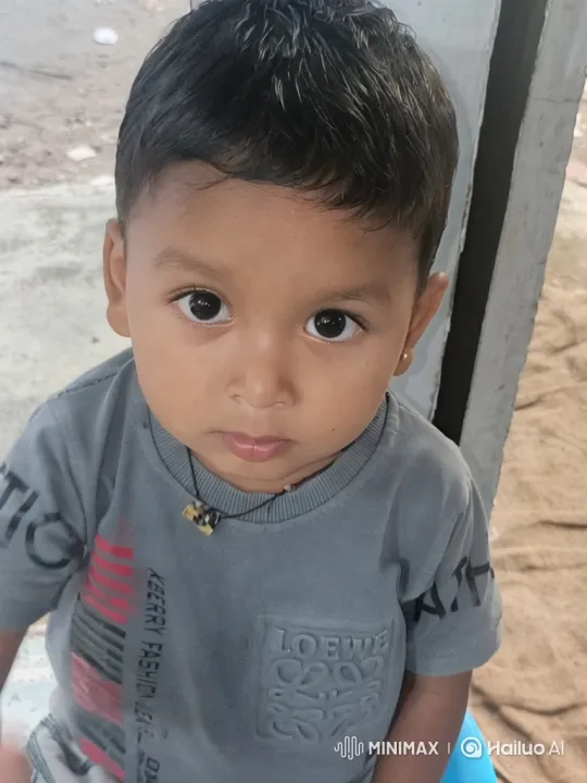 Innocent Smile of a Contemplative Young Boy – AI Generated Video | Hailuo AI