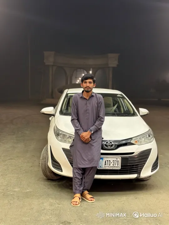 Young Man in Grey Attire Escorted by Security, Drives Off Under Shower of Flower Petals – AI Generated Video | Hailuo AI