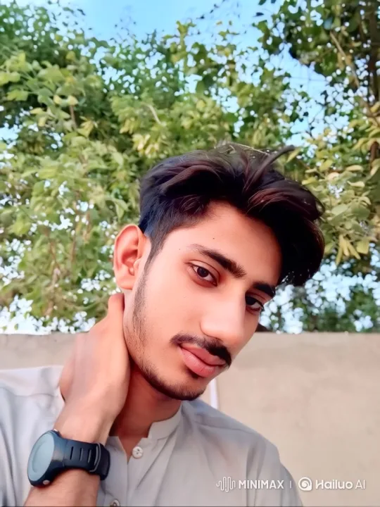 Close-up of a Young Man with a Gentle Smile – AI Generated Video | Hailuo AI