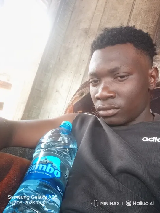 Stylish Young Man in Calm Sitting Pose with Complex Camera Movements – AI Generated Video | Hailuo AI