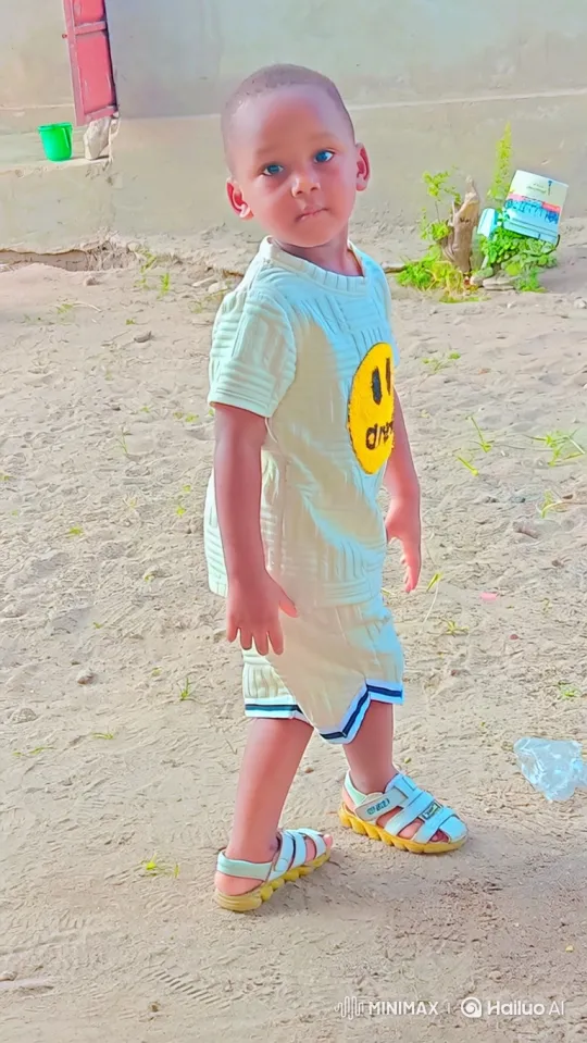 Young Boy in Yellow Outfit Approaches Car – AI Generated Video | Hailuo AI