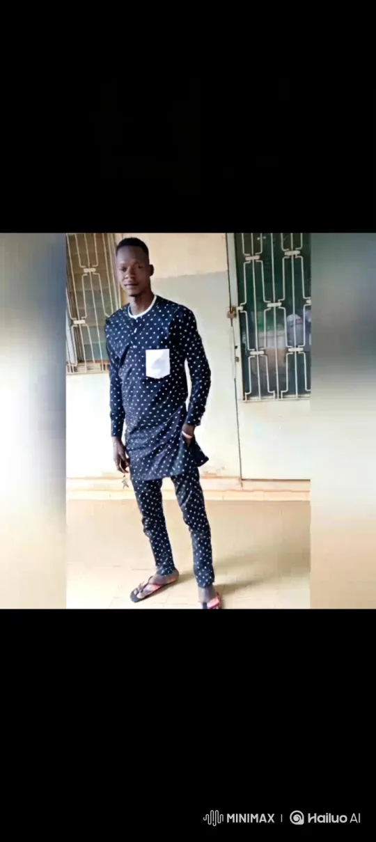 Young Black Man in Polka-Dot Outfit on Porch – AI Generated Video | Hailuo AI
