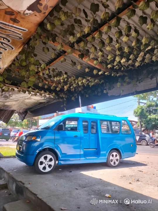 Custom Blue Van Transforms with Smooth Lowering Mechanism – AI Generated Video | Hailuo AI