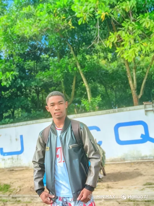 Young Man Walks Through Outdoor Setting – AI Generated Video | Hailuo AI