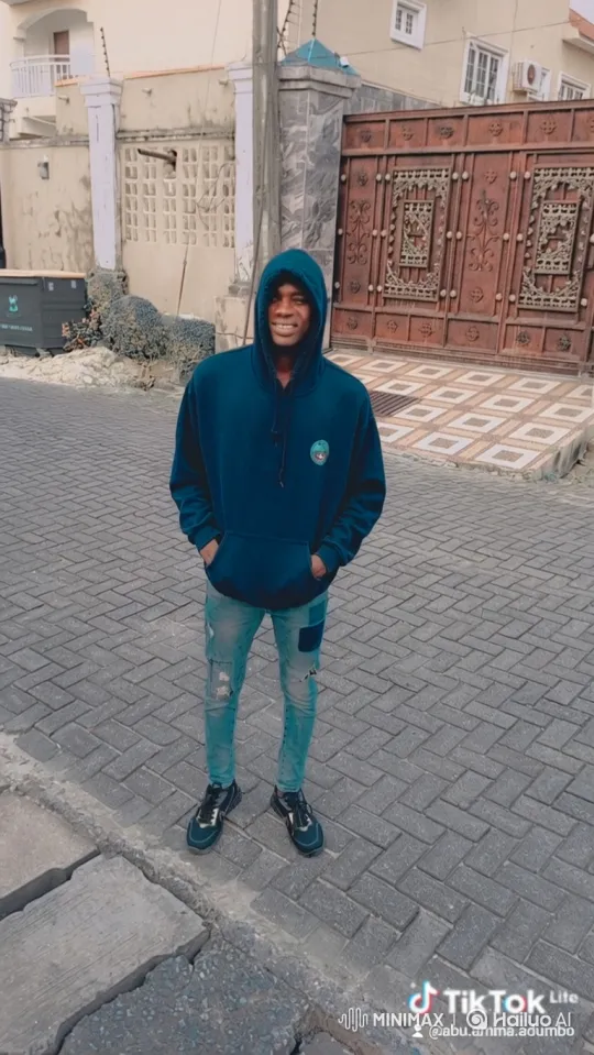 Chelsea Fan Celebrates in Front of Stamford Bridge – AI Generated Video | Hailuo AI