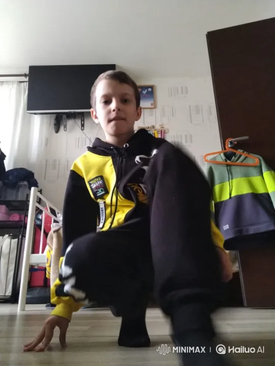 Young Boy Performs Successful Forward Somersault – AI Generated Video | Hailuo AI