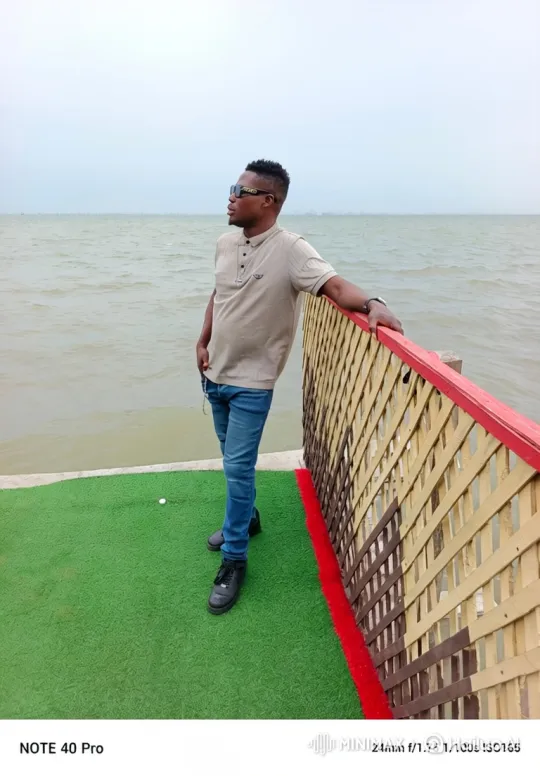 Man on Pier Watches Speedboat with Hopeful Smile – AI Generated Video | Hailuo AI