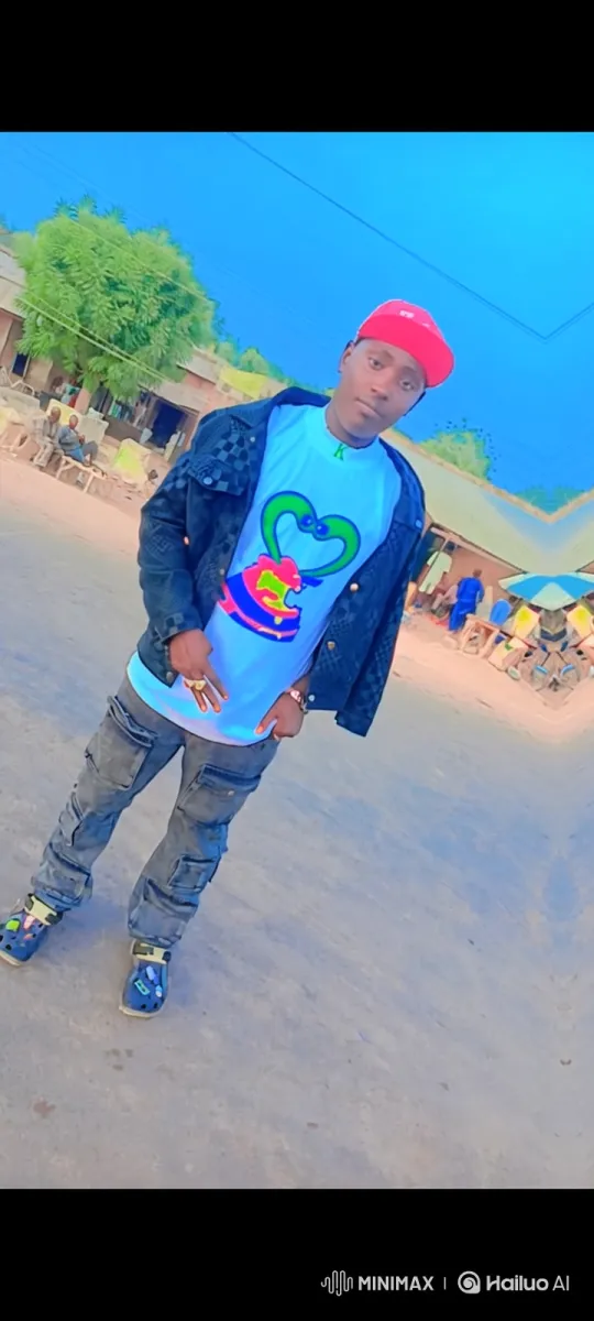 Young Man Poses Stylishly in Outdoor Setting – AI Generated Video | Hailuo AI