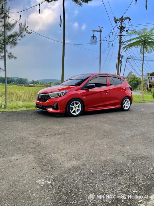 Red Hatchback Demonstrates Air Suspension Lowering – AI Generated Video | Hailuo AI