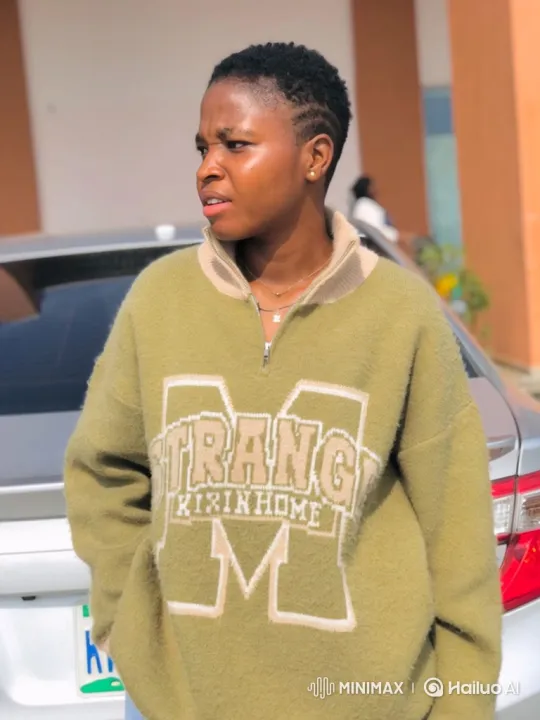 Young Person Enters Car, Pausing for Thoughtful Moment – AI Generated Video | Hailuo AI