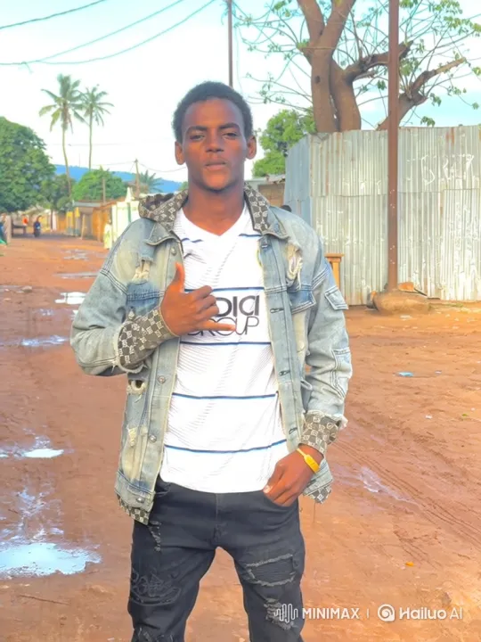 Young Man in Village Setting Maintains Poised Stance – AI Generated Video | Hailuo AI