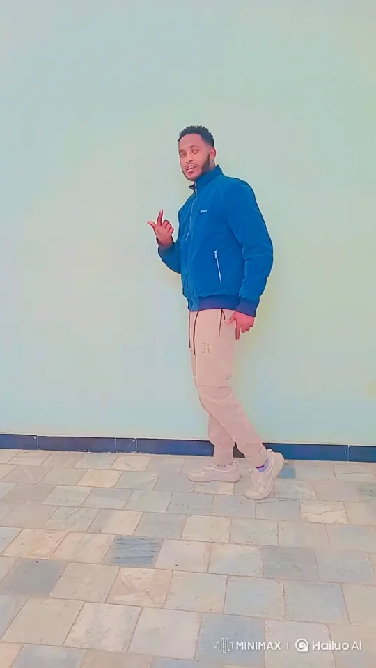 Man in Casual Outfit Performs Fluid Dance-Like Movements – AI Generated Video | Hailuo AI