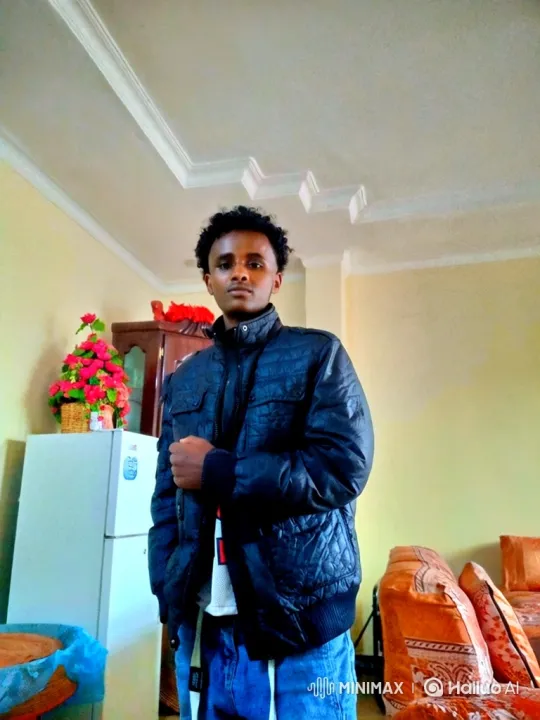 Young Man's Smile Evolution in Living Room Setting – AI Generated Video | Hailuo AI