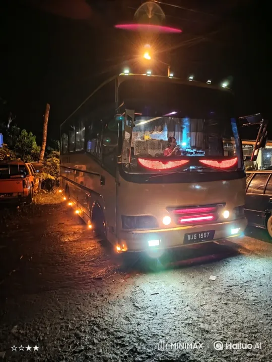 Customized Bus Roars to Life on Dark Road – AI Generated Video | Hailuo AI