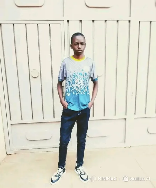 Young Man in Casual Attire Stands Calmly Before Camera – AI Generated Video | Hailuo AI
