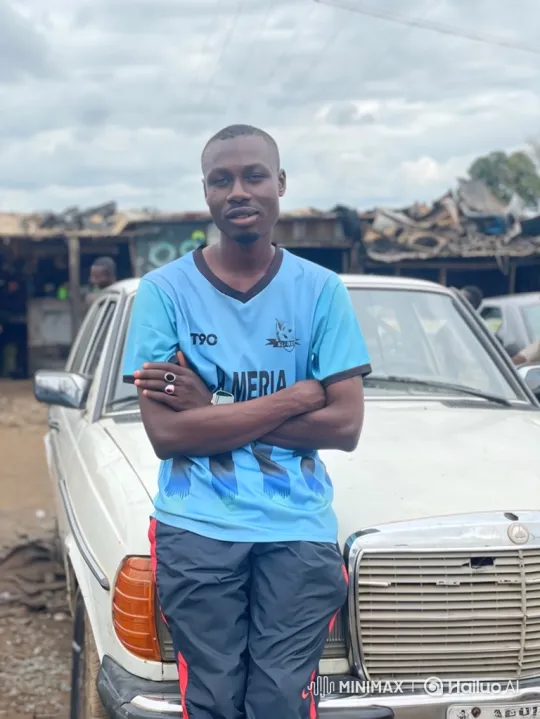 Young Man in Vintage Sedan: Candid, Confident, and Warm – AI Generated Video | Hailuo AI