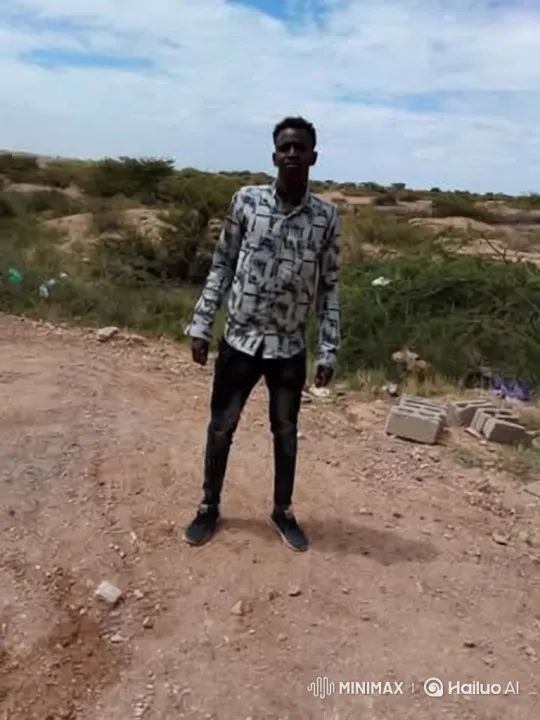 Young Man Contemplates on a Dusty Path – AI Generated Video | Hailuo AI