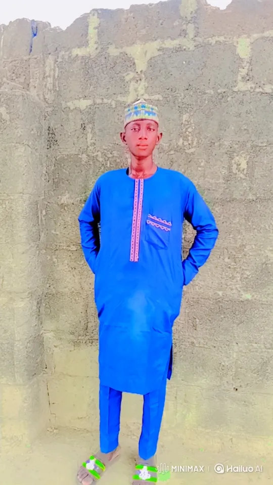 Young Man in Royal Blue Embroidered Outfit Stands Calmly – AI Generated Video | Hailuo AI