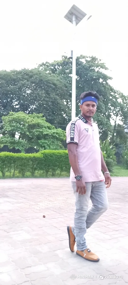 Young Man Poses and Walks in Park Setting – AI Generated Video | Hailuo AI