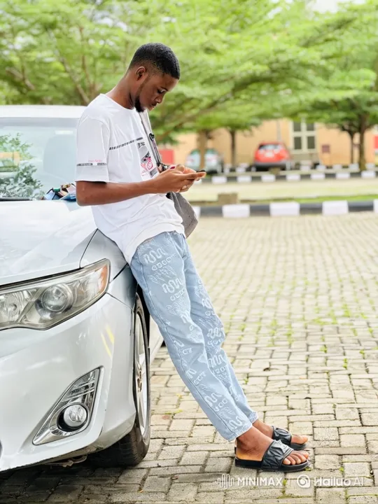 Young Man Enters Car After Using Smartphone – AI Generated Video | Hailuo AI