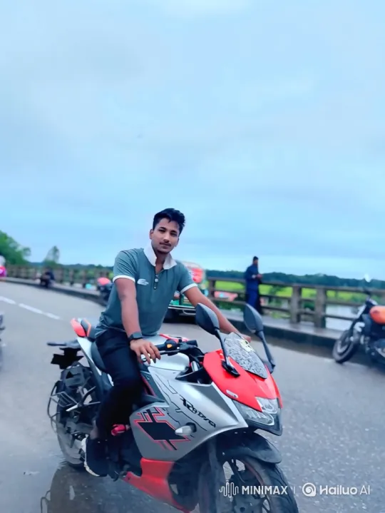 Young Man Rides Motorcycle on Wet Bridge – AI Generated Video | Hailuo AI