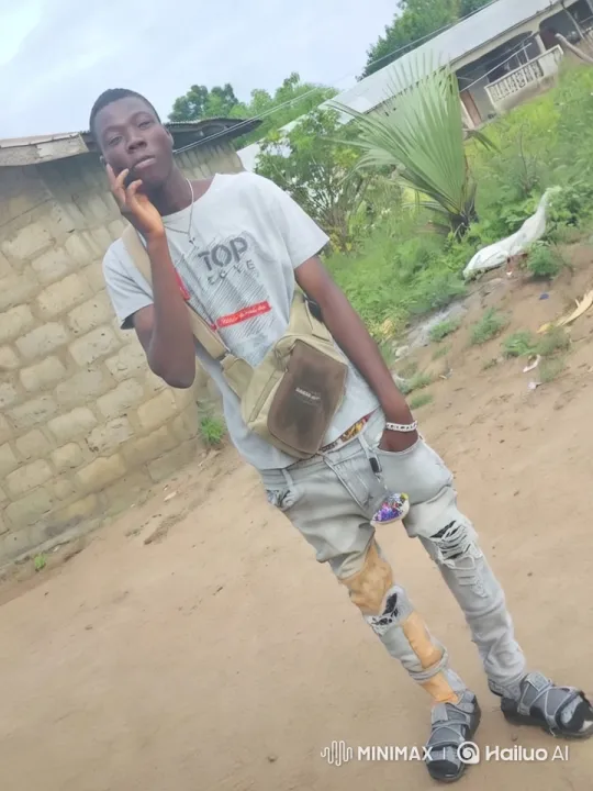 Young Man in Rustic Setting on Phone – AI Generated Video | Hailuo AI