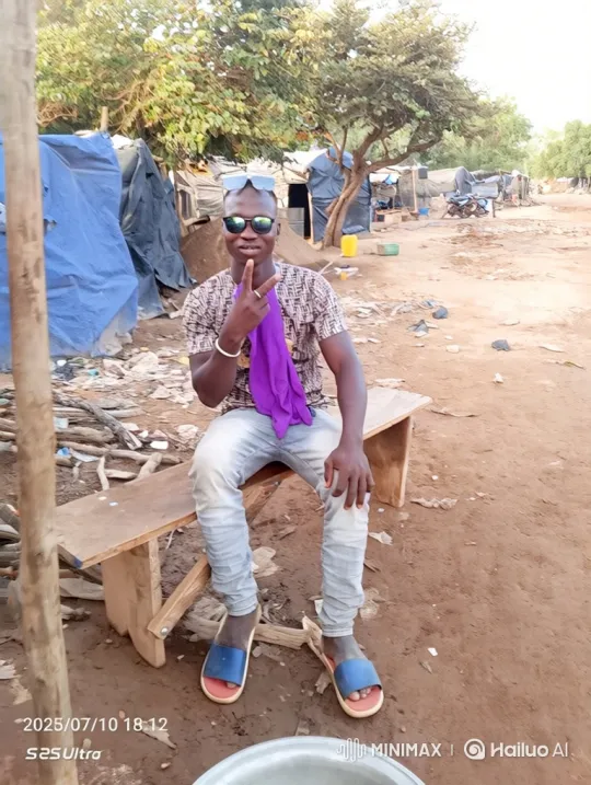 Young Man in Rustic Setting with Peace Sign – AI Generated Video | Hailuo AI