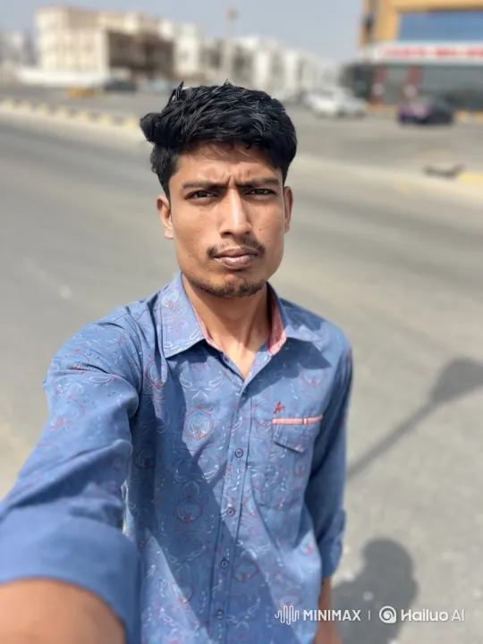 Young Man Takes Selfie in Sunny Day Street Setting – AI Generated Video | Hailuo AI