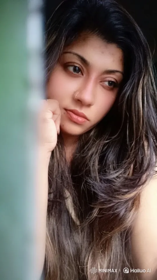 Young Woman in Contemplative Moment – AI Generated Video | Hailuo AI