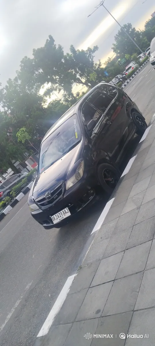 Transformation of a Minivan: Slow Descent into Modified Stance – AI Generated Video | Hailuo AI