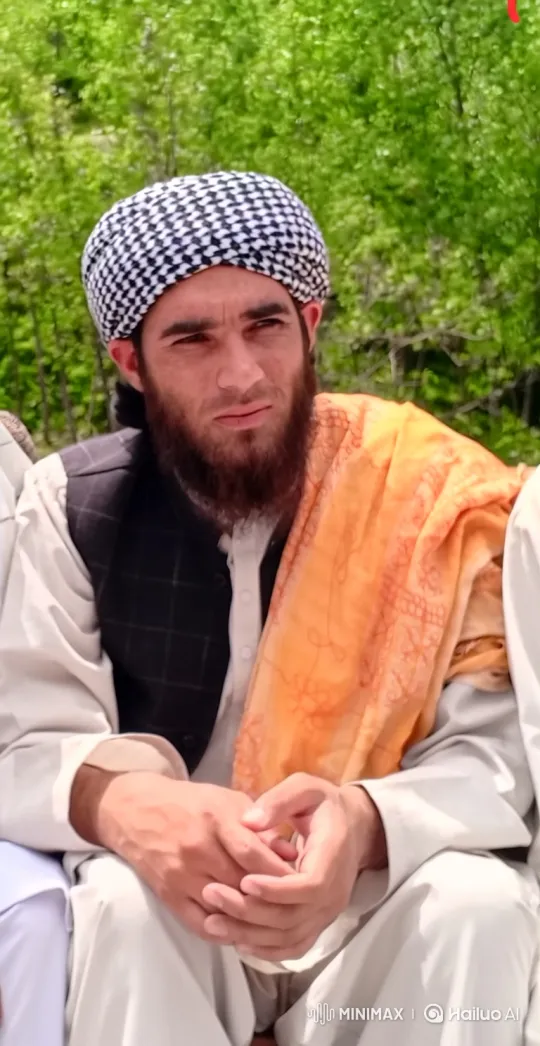 Man in Nature: Pensive, Dressed in White, Orange Shawl – AI Generated Video | Hailuo AI