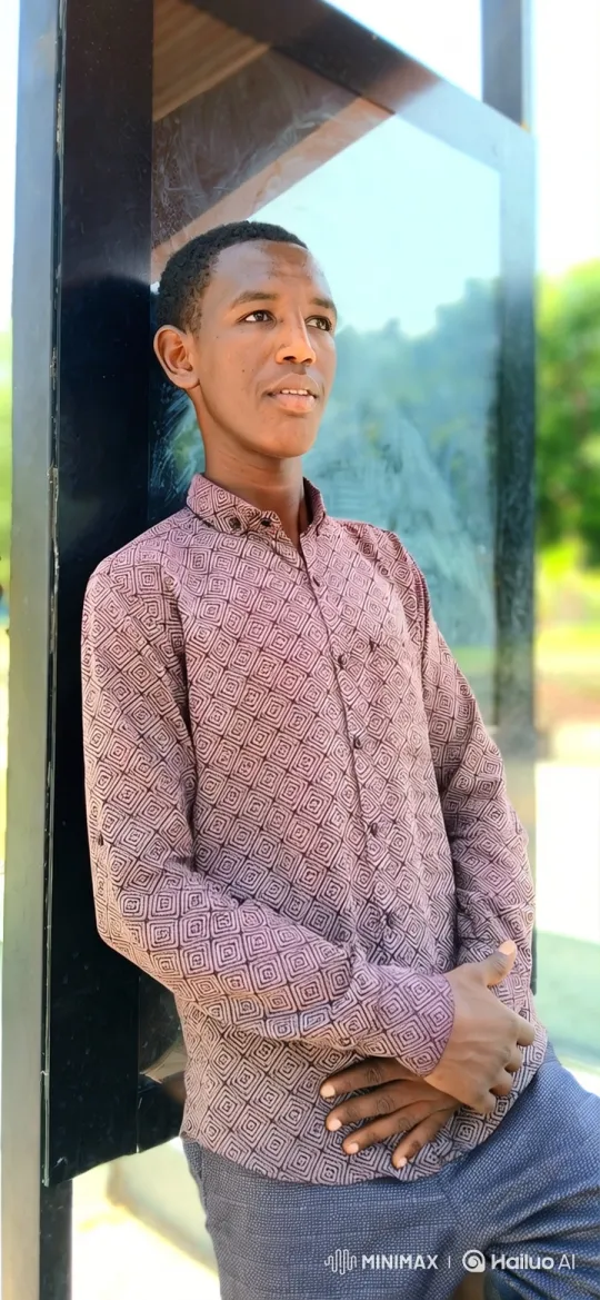 Young Man in Thoughtful Pensive Pose by Window – AI Generated Video | Hailuo AI