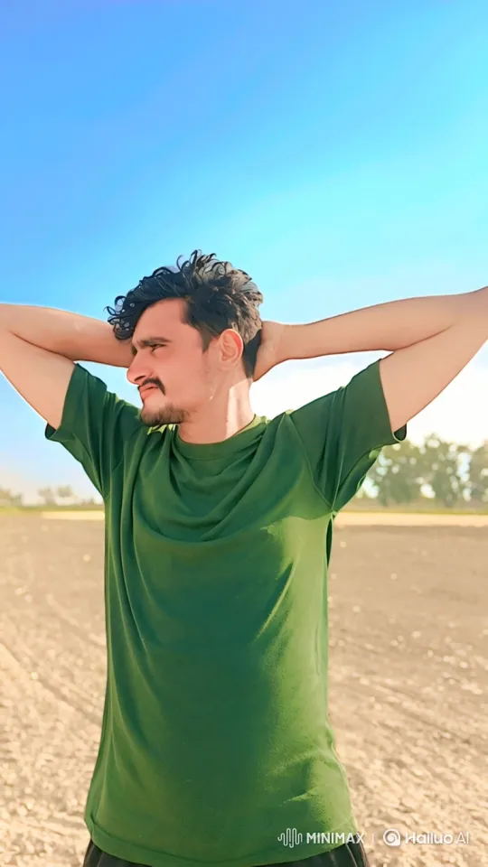 Young Man Reflects in Sunlit Field – AI Generated Video | Hailuo AI