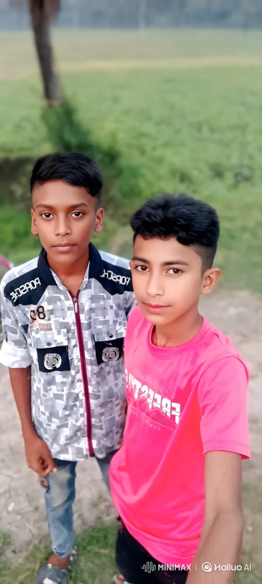 Boys Share a Gentle Moment in a Green Field – AI Generated Video | Hailuo AI