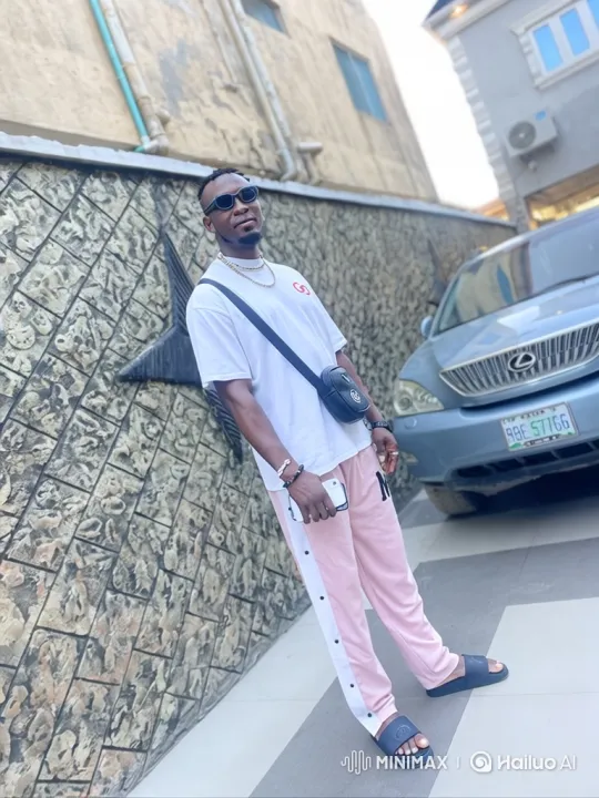 Man Poses Confidently with Sunglasses and Smartphone – AI Generated Video | Hailuo AI