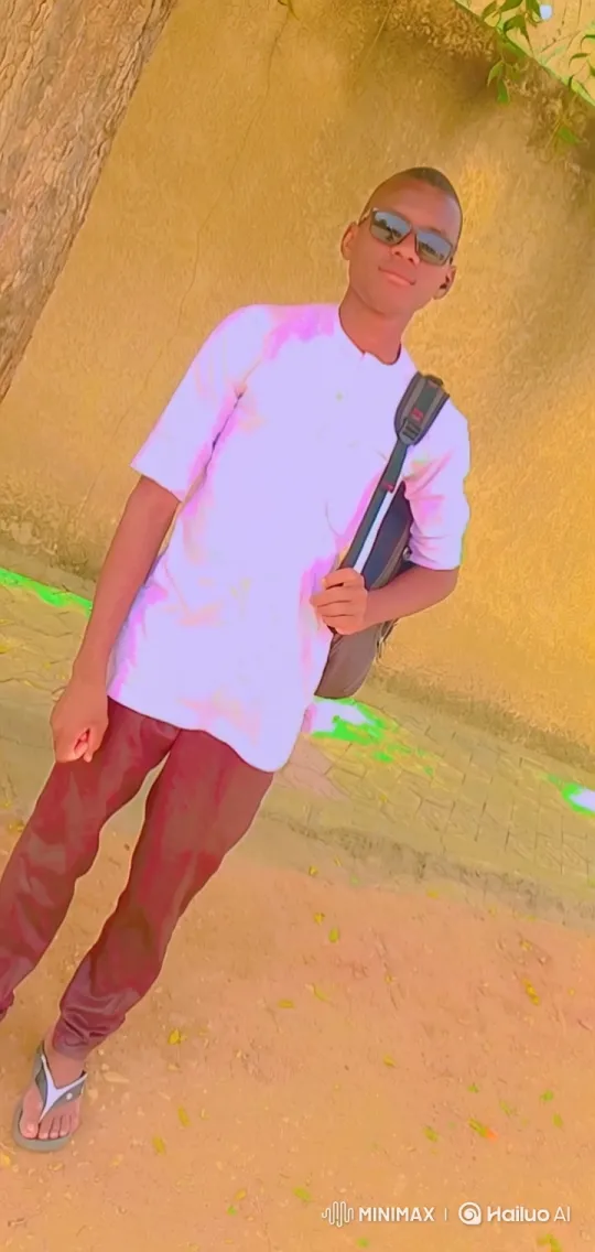 Young Man Poses Confidently in Sunny Outdoor Scene – AI Generated Video | Hailuo AI