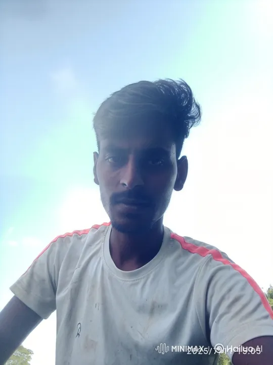 Young Man in Thoughtful Stare with Gentle Breeze – AI Generated Video | Hailuo AI