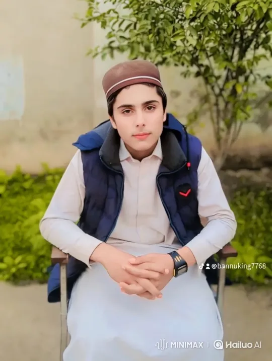 Young Man Smiles Gently in Peaceful Setting – AI Generated Video | Hailuo AI