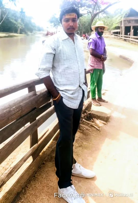Young Man Observes Off-Road Vehicle Arrival by Riverside – AI Generated Video | Hailuo AI