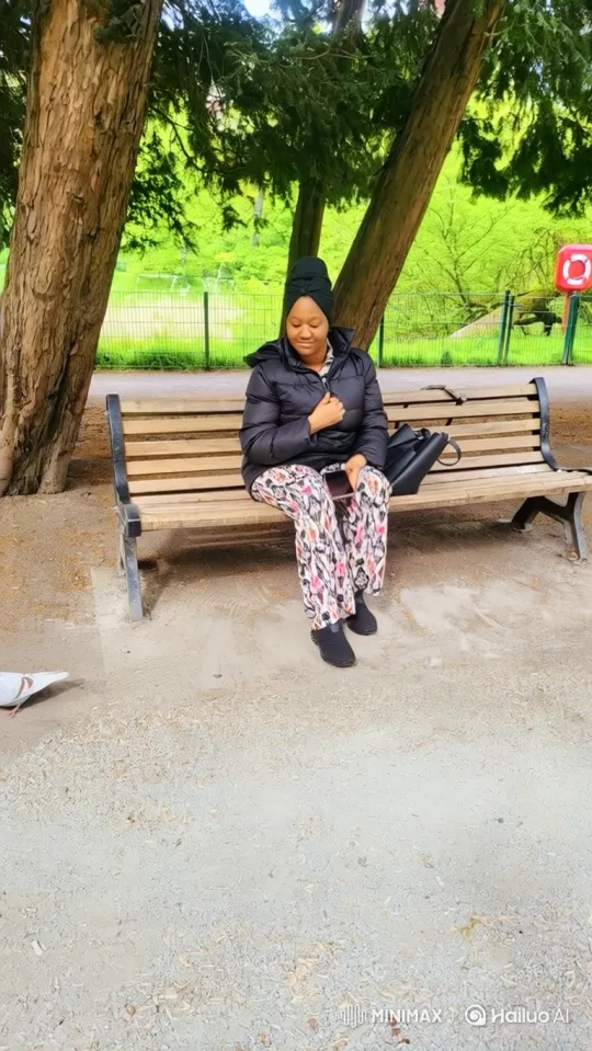 Woman in Park Prepares to Enter Parked Sedan – AI Generated Video | Hailuo AI