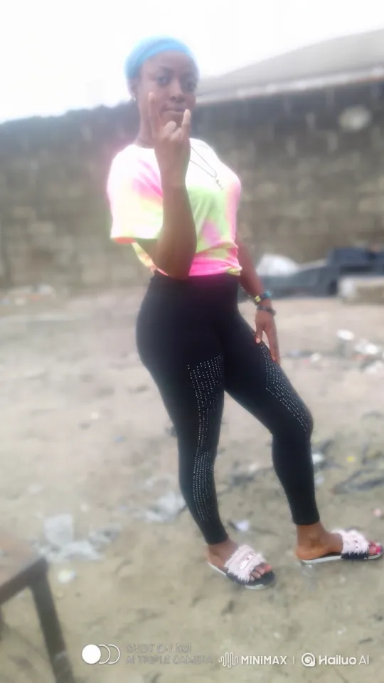 Young Woman Enters Red Sports Car in Sandy Lot – AI Generated Video | Hailuo AI