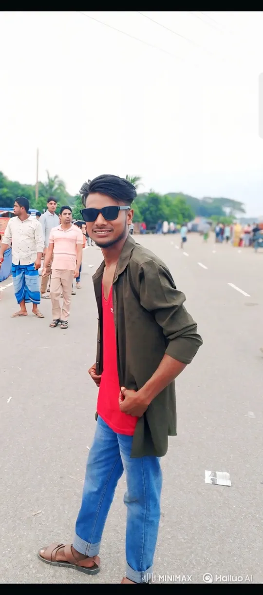 Young Man Smiles, Steps Forward on Paved Road – AI Generated Video | Hailuo AI