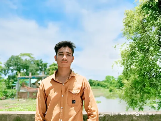 Young Man in Serene Landscape Amidst Gentle Breeze – AI Generated Video | Hailuo AI