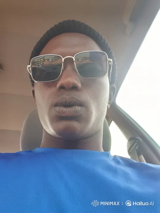 Man in Car: Close-Up, Camera Moves, and Head Turn – AI Generated Video | Hailuo AI