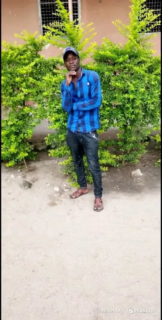 Young Man Transitions from Stiff Pose to Relaxed Stance – AI Generated Video | Hailuo AI