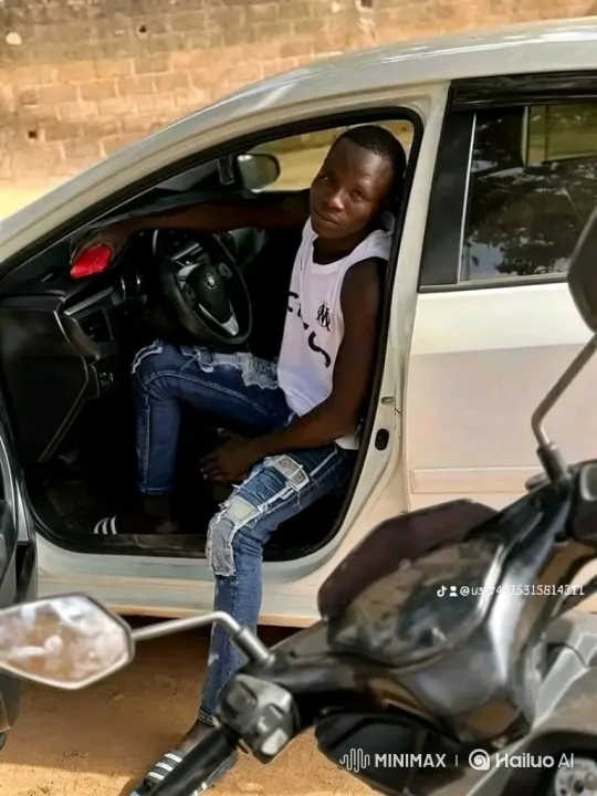Young Black Man Prepares to Drive in Silver Car – AI Generated Video | Hailuo AI