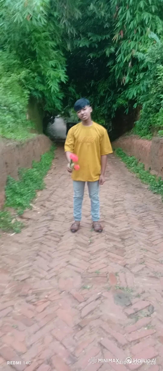 Young Man Reflects Amidst Bamboo Path – AI Generated Video | Hailuo AI